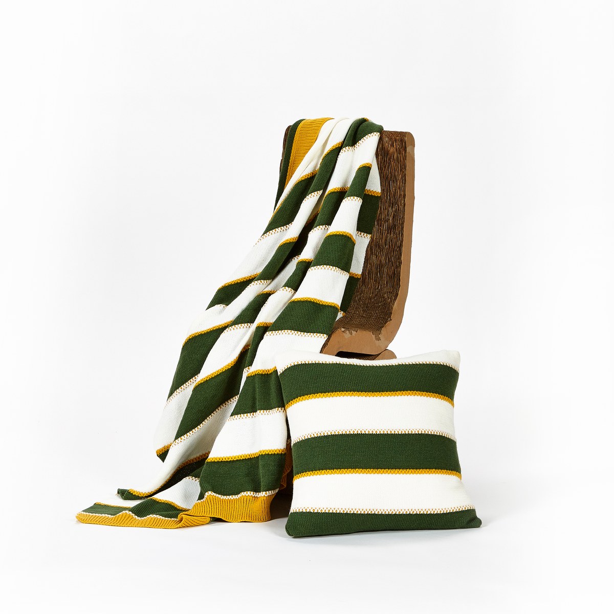Green and white striped throw